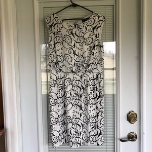 Scarlett white and black cocktail dress with sequins.